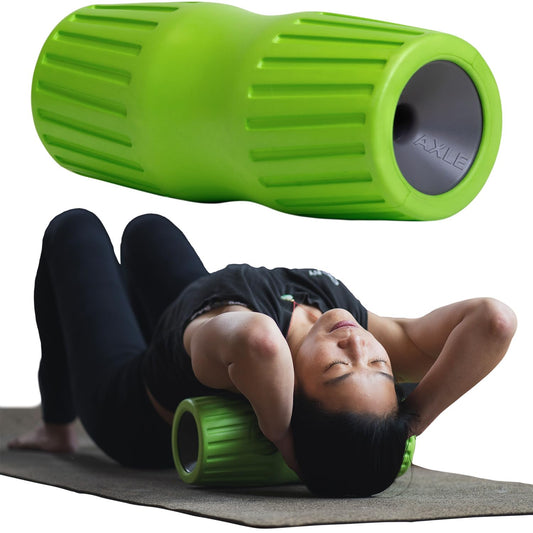 Person using a green foam roller on a mat with another green foam roller above.